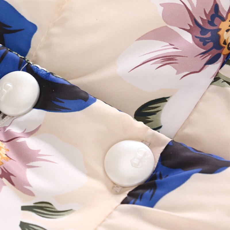 Moda cappotto carino da bambina con stampa orchidea invernale