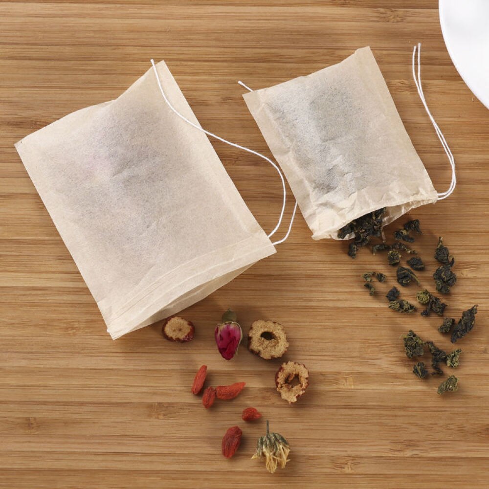 Ounona 200 pces drawstring saco de chá filtro de papel vazio saquinho de chá sacos para folhas soltas chá em pó ervas (branco)
