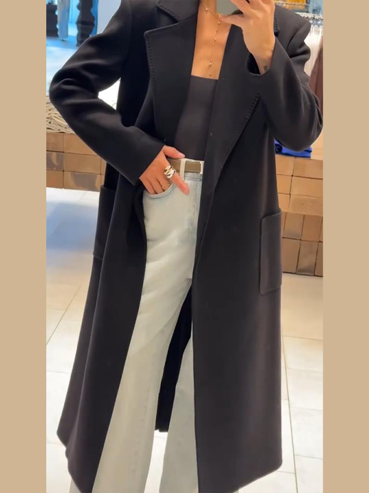 Elegante dames zwarte lange jas met riem Stijlvolle revers Veterschoenen Trenchcoat Herfst Winter Wolmix Bovenkleding Mode-outfit