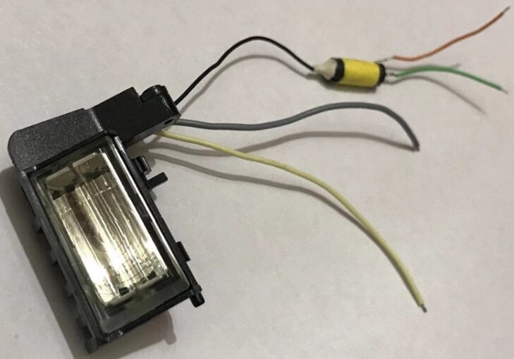 Camera flash head light indicator