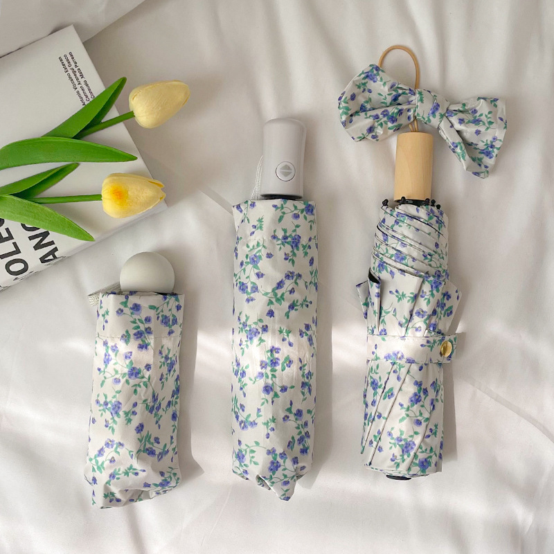 1-delige kleine blauwe bloemenparaplu, zachte stijl, zonbescherming, drievoudige automatische paraplu voor alle weersomstandigheden