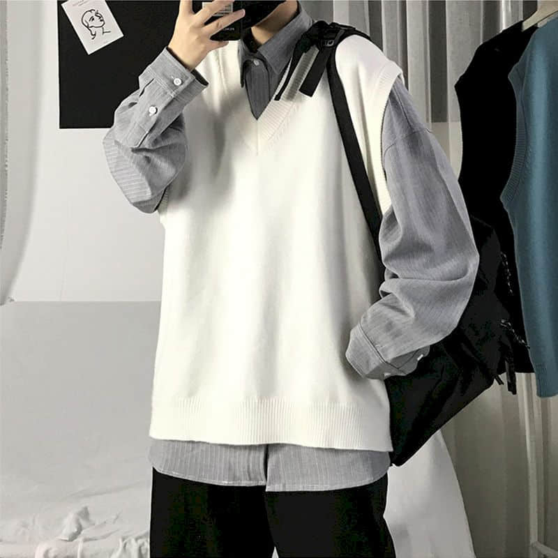 Suéter de punto para hombre, chaleco de Otoño de color sólido, tendencia de estilo coreano, holgado, con cuello en V, sin mangas, estilo universitario