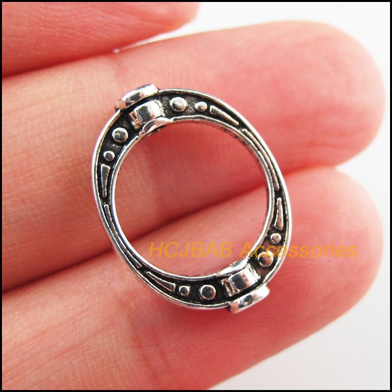 30 cuentas espaciadoras de marco ovalado chapadas en plata tibetana, oro envejecido y bronce, 14,5x19,5mm: Plata