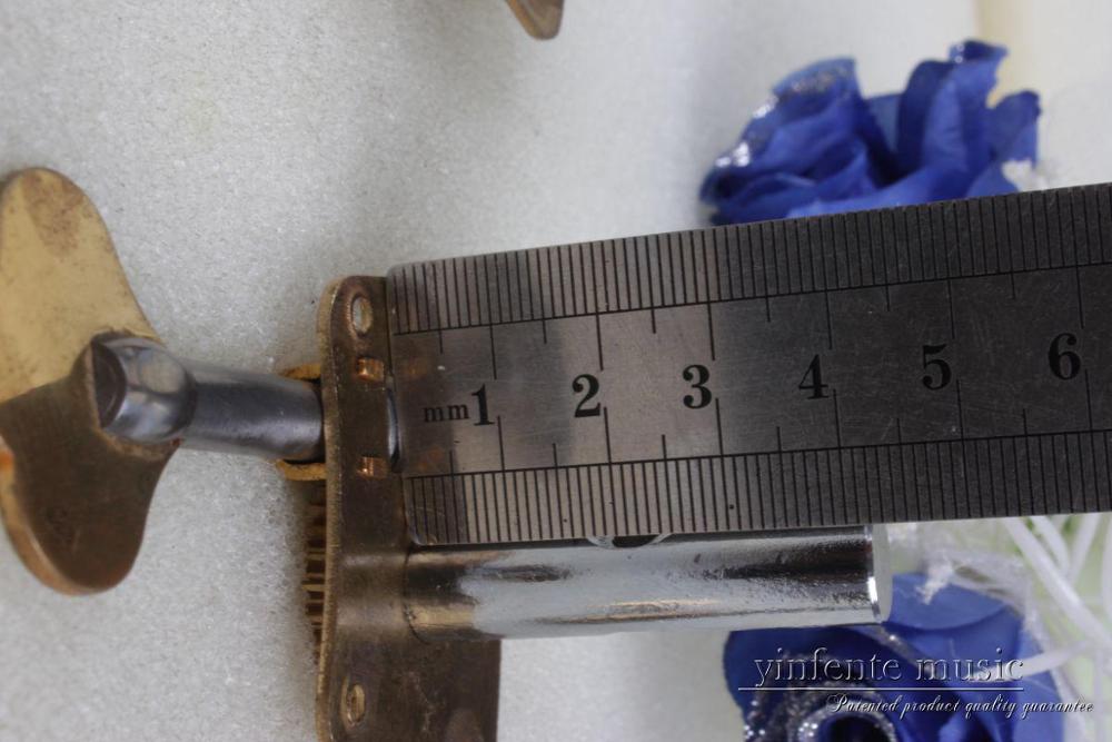 Un juego de 4/4 chelo bobinador de cuerda de clavija unido a la máquina de latón clavijas para Violoncelo Cello partes y accesorios
