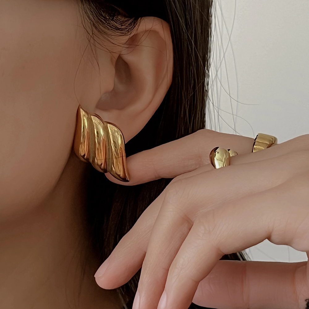 Pendientes geométricos con textura de acero inoxidable para mujer, aretes con nudo torcido chapado en oro de Metal liso, joyería Vintage llamativa