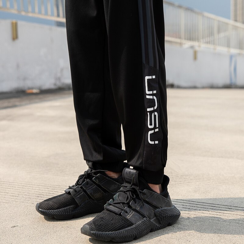 Lente- en herfstbroeken heren losse sport casual negenpunts lange broek heren trend