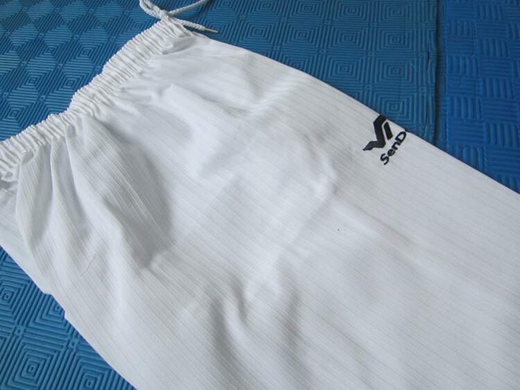 Uniforme de Taekwondo WTF Doboks, ropa deportiva con cuello en V y tela especial, nueva , cómoda y Noble