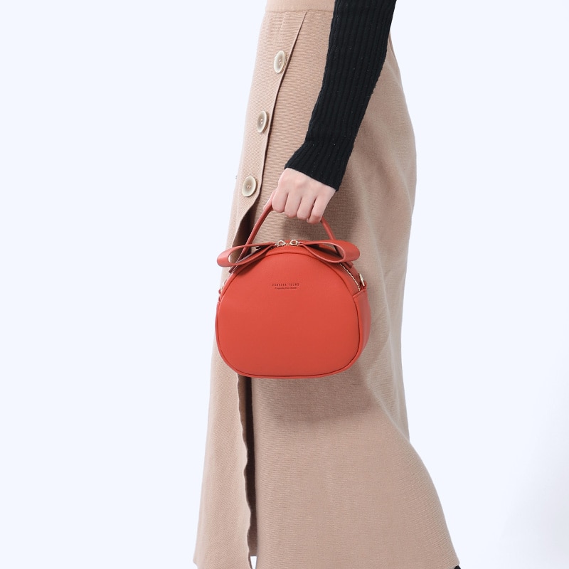 Chaude circulaire femmes Sac à bandoulière en cuir femmes bandoulière sacs de messager Sac femme ronde Bolsa dames Sac à main mignon fourre-tout