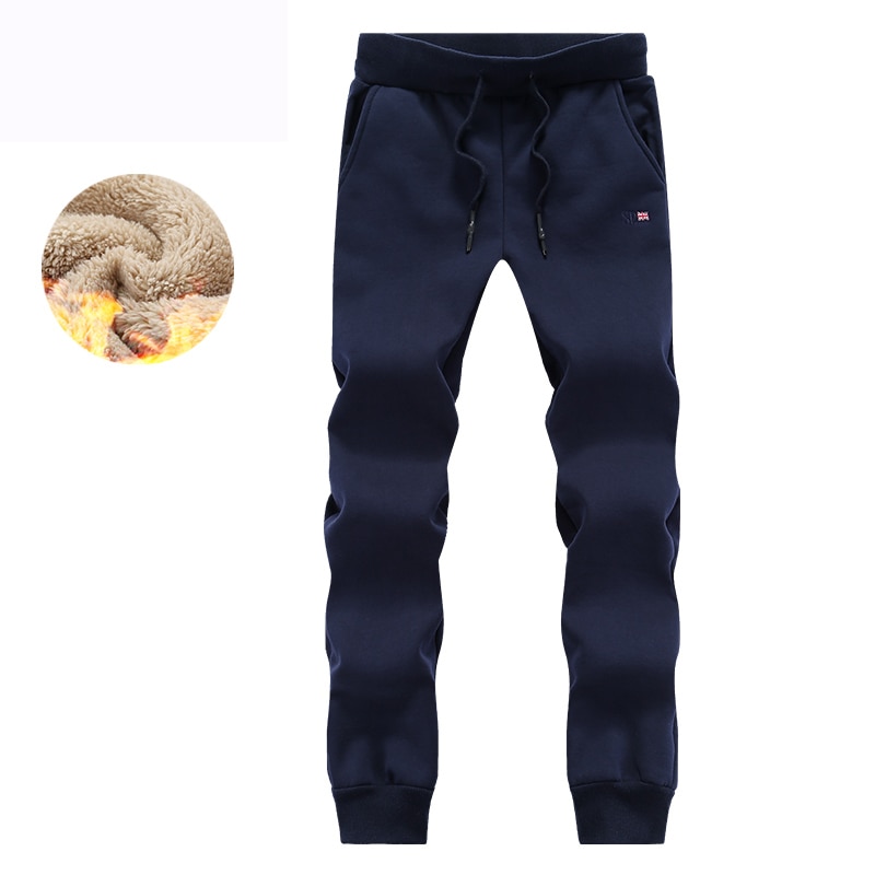 Męskie ciepłe spodnie zimowe zagęścić polarowe męskie spodnie dresowe dorywczo Faux futro Jogger Hombre mężczyźni Hip Hop ciężkie aksamitne spodnie 5XL