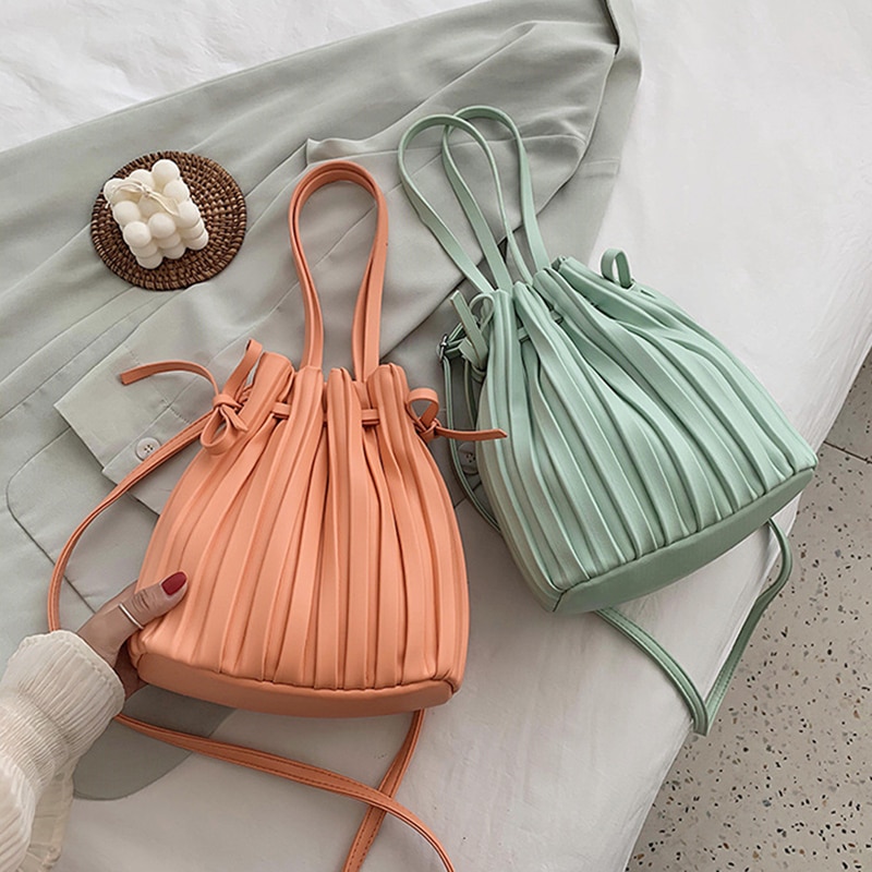 Trekkoord open emmer crossbody tassen voor vrouwen effen kleur geplooide schouder handtassen reis crossbody tas portemonnee