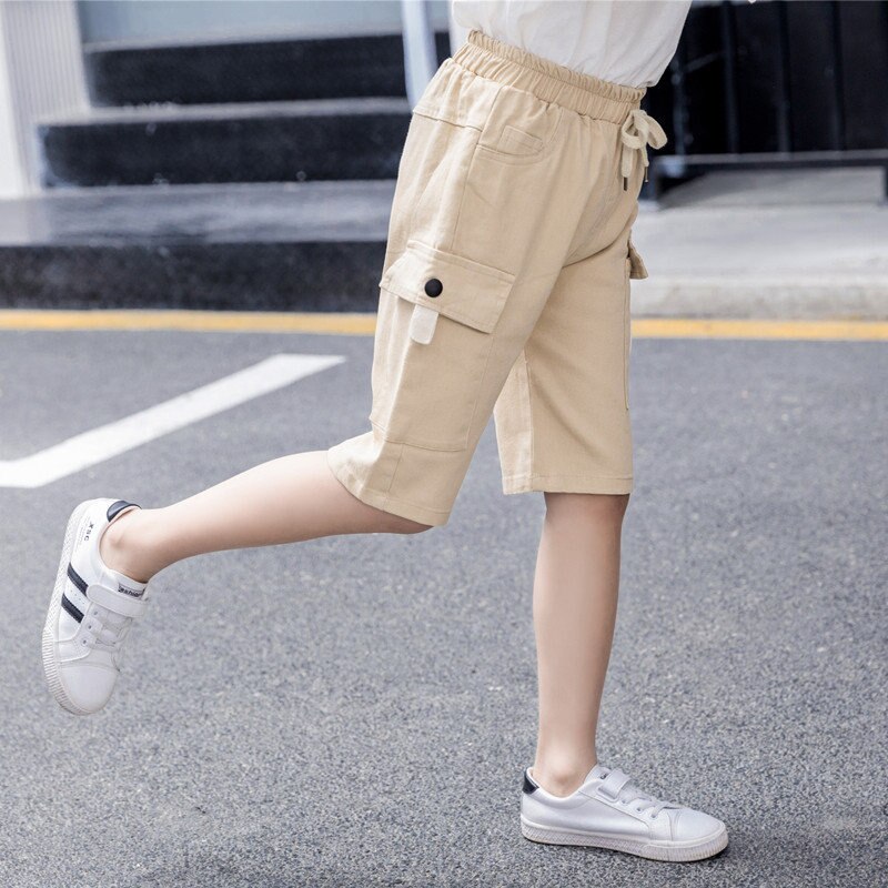 Sommar barns fritidsshorts pojkar flickor enfärgad resår i midjan korta byxor unisex barn strandshorts för 5-13 år