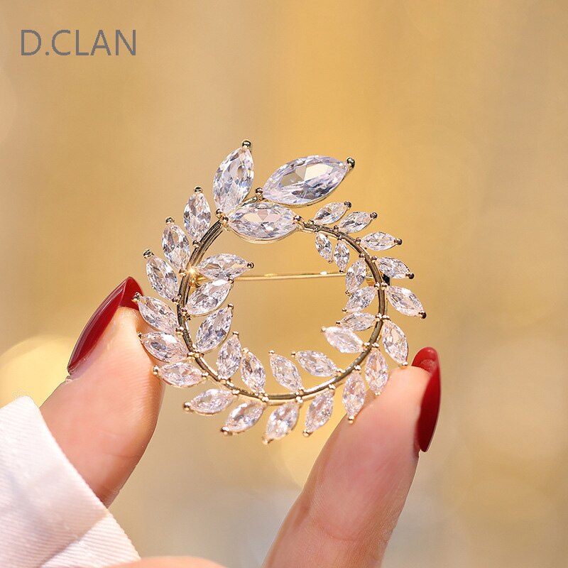 D.Clan schmuckbrosche aus zirkonia in olivenblattform, funkelndes accessoire für damen