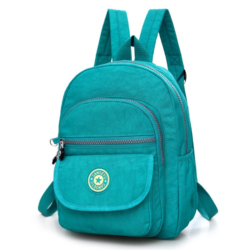 Kvinder nylon skole kvindelig rygsæk lille vandtæt rygsæk solid afslappet skuldertaske multifunktionelle skoletasker: Lysegrøn