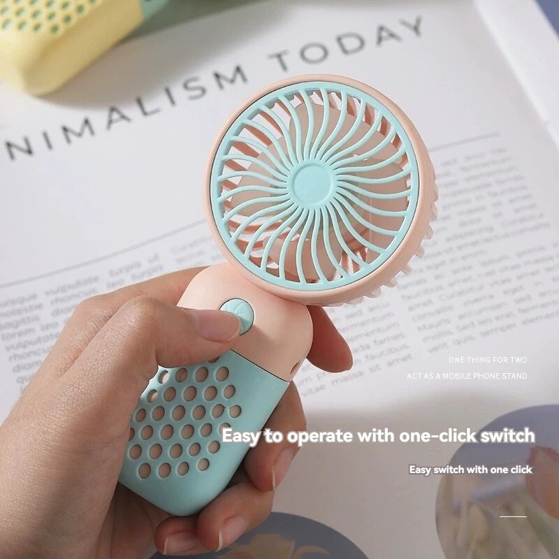 2025 draagbare oplaadventilator Cartoon schattige kleine student Opladen kleine ventilator Draagbare mini-USB-ventilator Mini-zak