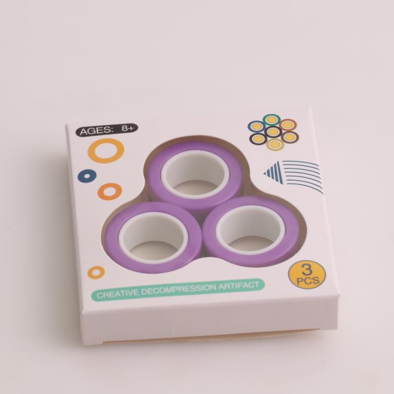 Anti-stress magnetiska magiska ringar packa upp leksaker för magiker trick rekvisita dekomprimering magiska trick små ornament: Lila