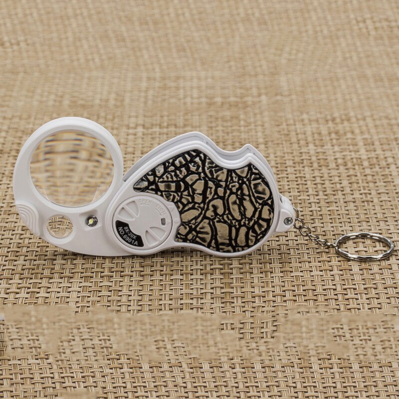 Lupa LED de doble aumento con llavero plegable iluminado tamaño de bolsillo MINI lupa 8x37mm 20x12mm plegable: Plata