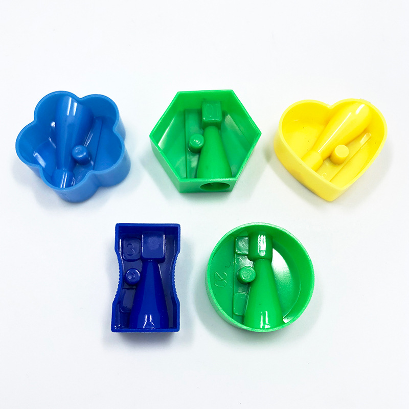 Sacapuntas pequeño multicolor de un solo orificio para niños, Sacapuntas de plástico manual para escuela primaria