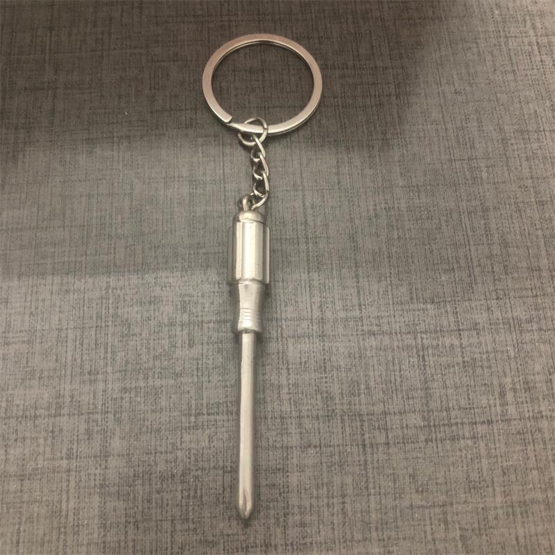 ¡Producto en oferta! Mini llave inglesa de Metal ajustable, llavero con anilla, llavero de , de: Blanco