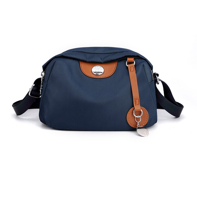 Nylon dames waterdichte grote capaciteit crossbody tas casual effen kleur messenger schoudertas: Blauw