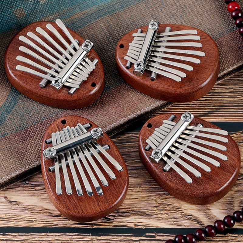 Mini Kalimba à 8 touches, piano à pouces, piano à doigts exquis, Marimba portable, pendentif musical, clavier à 8 touches