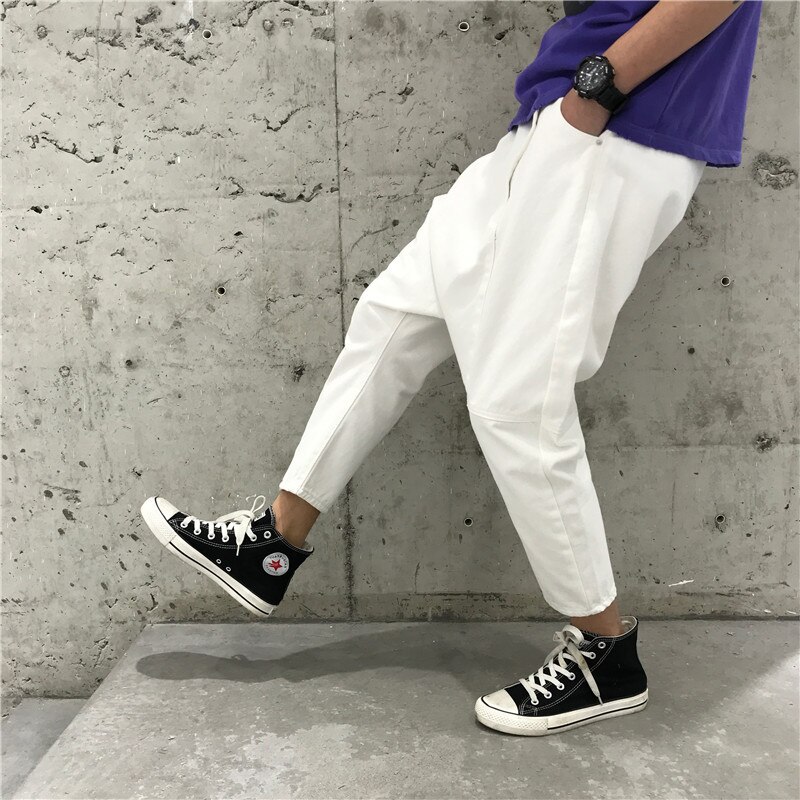 Cavallo basso Dei jeans Pantaloni Degli Uomini gonfio Cavallo Basso denim Pantaloni stile harem Maschio anca salto strada danza Allentati Pantaloni Della Tuta di proprietà X9141