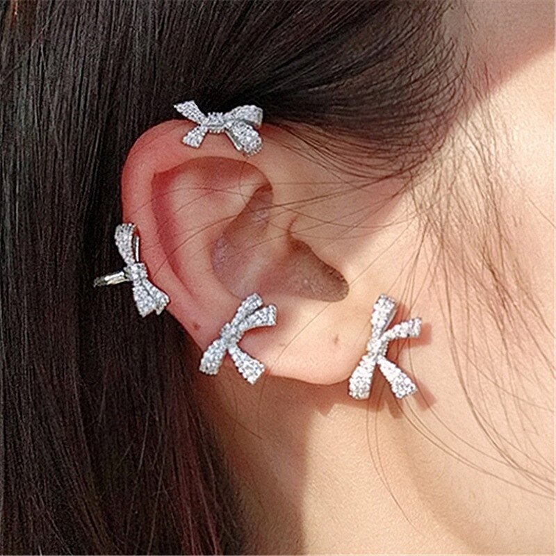 Orecchini coreani Super Flash Fashion Bow Sen orecchini a Clip fata orecchini senza temperamento traforato orecchini moda femminile Super fata