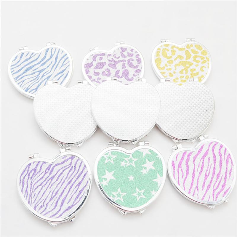 Mini poche en forme de coeur maquillage miroir cosmétique Compact miroirs Portable Double côtés maquillage miroir pour les femmes (couleur aléatoire)