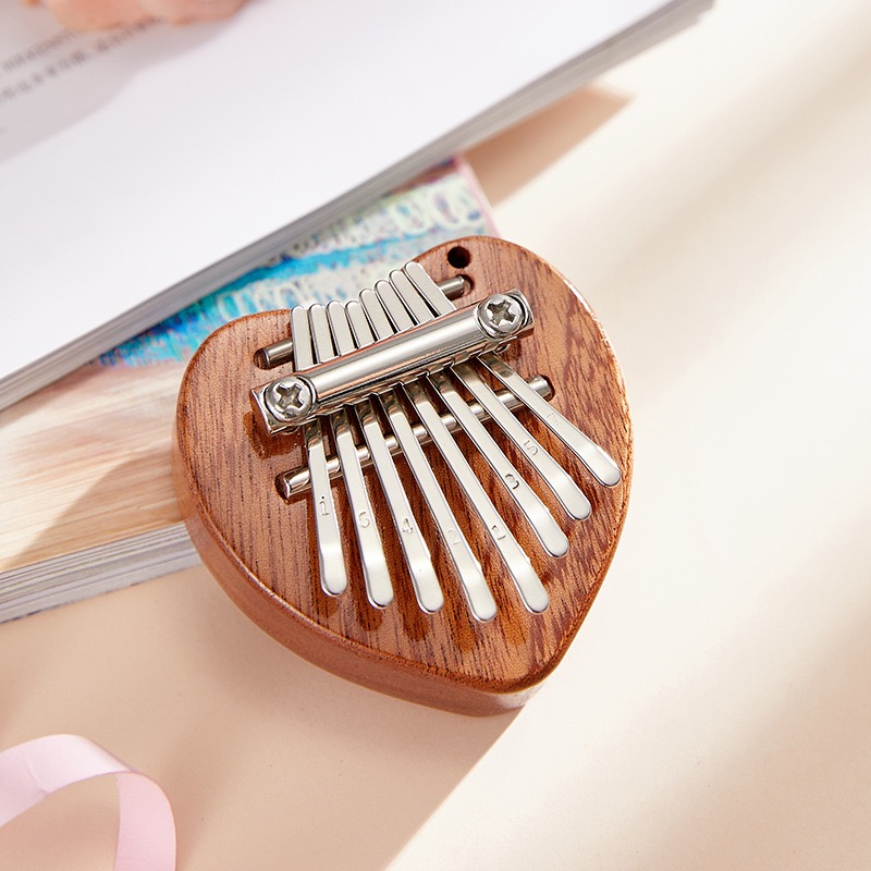 Mini Kalimba à 8 touches, piano à pouces, piano à doigts exquis, Marimba portable, pendentif musical, clavier à 8 touches: WHITE
