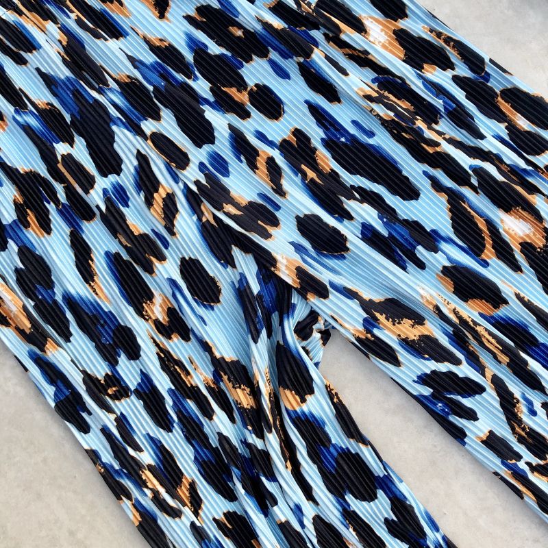 Kvinnor sommarveckade byxor hög midja street style leopardmönstrade blå byxor lös passform elastisk midja avslappnad byxor vida ben chica