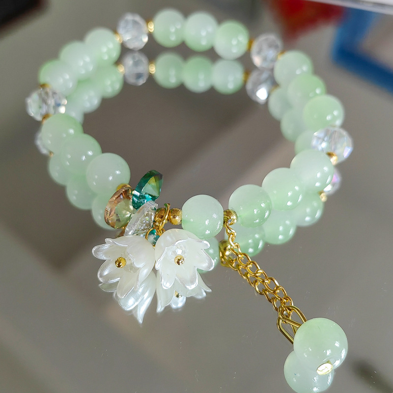 Bonita pulsera de cuentas de cristal verde para mujer, pulsera elástica ajustable con dije de flor de Lily Valley, joyería de cumpleaños y boda