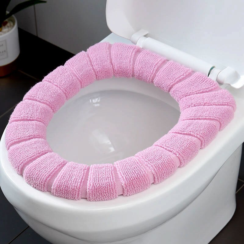 La couverture confortable de siège de toilette est des articles sanitaires chauds, doux et réutilisables de flanelle: Pink