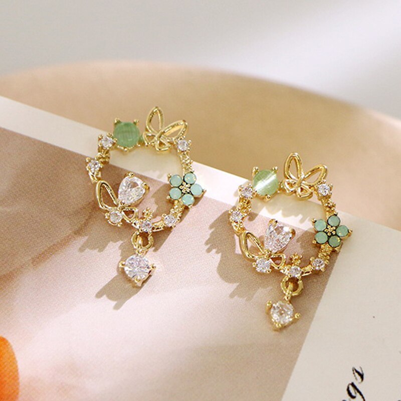 Nueva joyería de novedosa coreana, pendientes bonitos y frescos con forma de gota de aceite y flor, pendientes de cristal para mujer, de joyas de: Rodio plateado