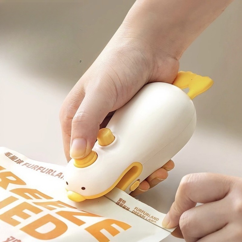 Eenvoudig te gebruiken vacuümverpakkingsmachine, kleine draagbare mini vacuümverpakkingsmachine voor voedsel om te voorkomen dat voedsel vochtig wordt.