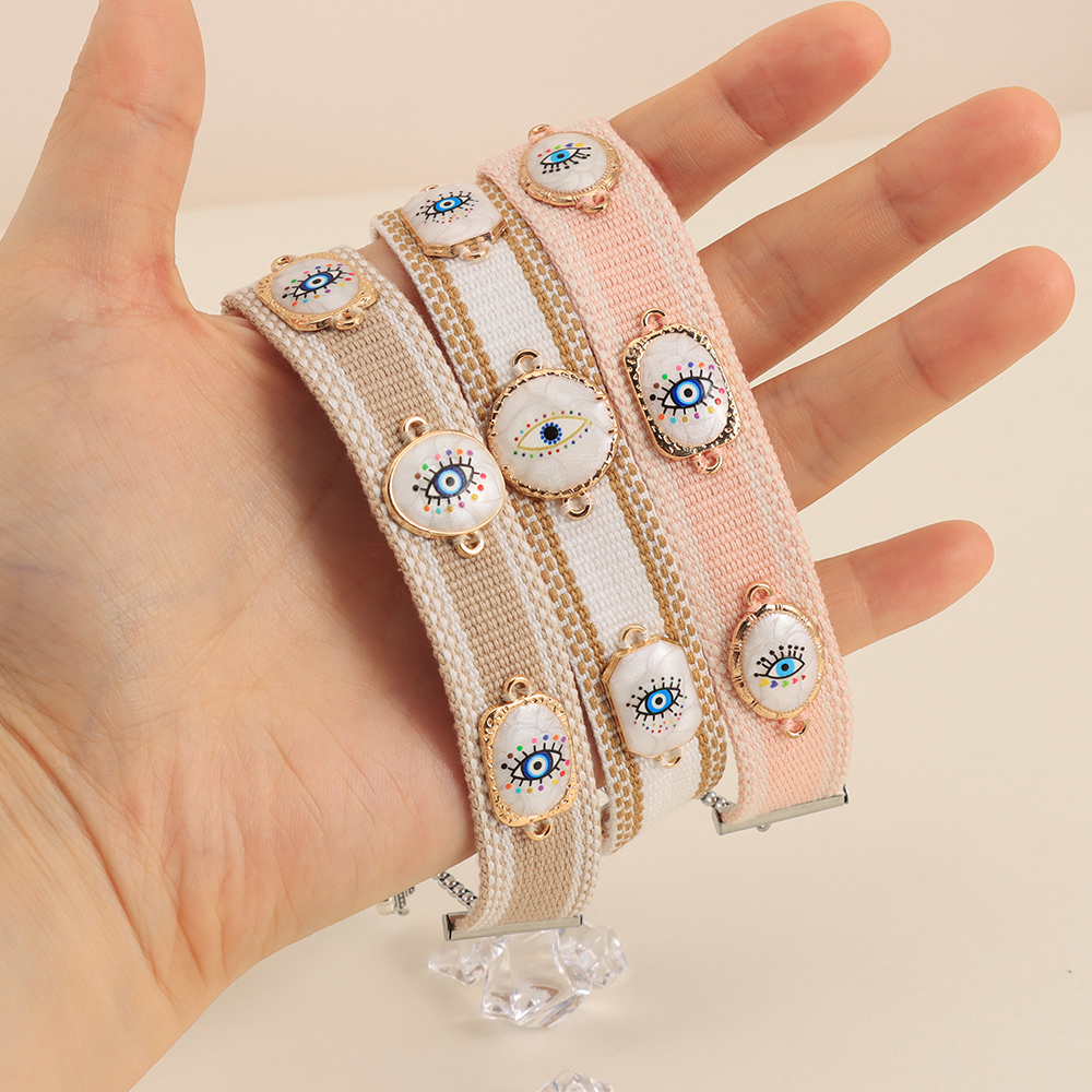 Pulseras tejidas de mal de ojos con dijes, pulseras de tela apilables