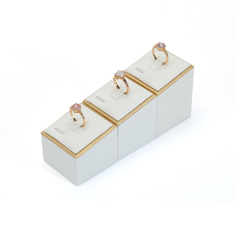 DIGU luxury jewelry display earrings rings pendants window showcase leather storage jewelry display: A three-piece ring