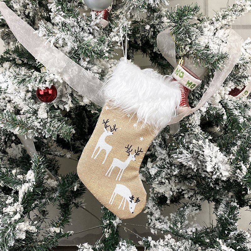 Juledekoration julestrømper ornamenter vedhæng små støvler børn år slikpose trædekorationer