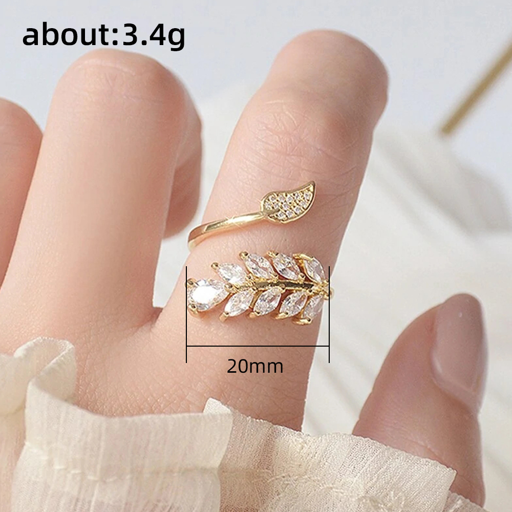 Huitan-anillos de hoja de olivo de estilo coreano para mujer, Color dorado, accesorios de lujo para dedo CZ, anillos con apertura ajustable, joyería
