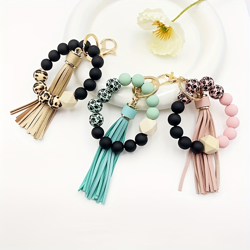 Llavero con cuentas de silicona para hombre y mujer, pulsera con cuentas y borlas para colgar carteras