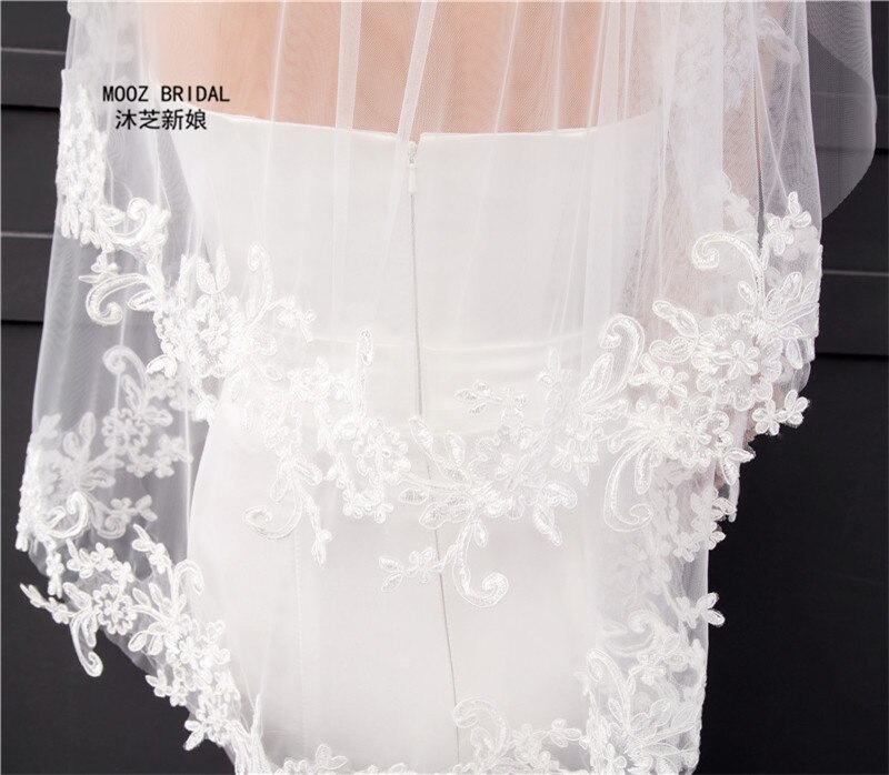 Coude longueur voile en Stock deux couches Appliques dentelle doux Tulle mariage voiles de mariée avec peigne en métal