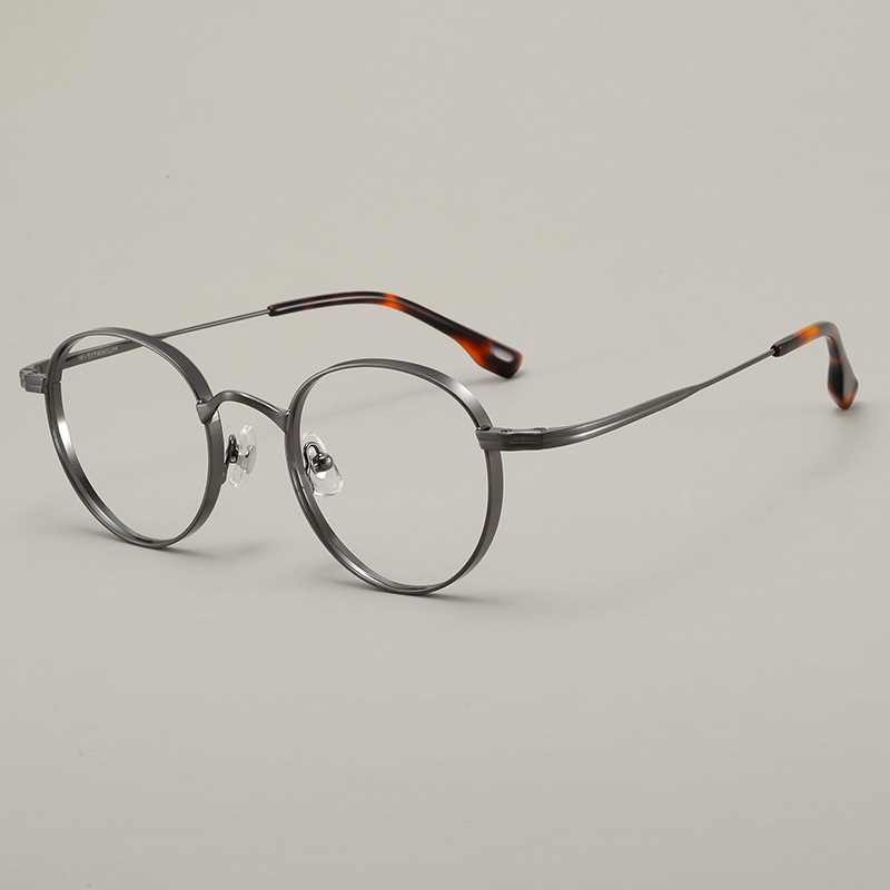 Små runde titanbriller merkevare ovale briller vintage justerbar nesepute utvidede innfatninger: Svart / Brun