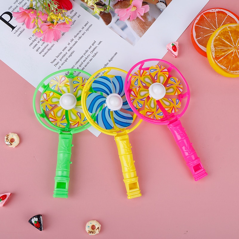 Molino de viento de plástico para bebés y niños, juguete infantil de molino de viento pequeño colorido, con mango silbante