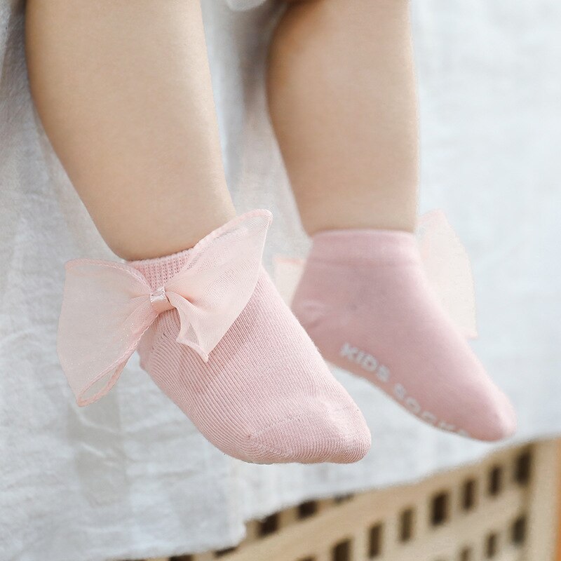 Antislip sokken voor baby's met strik, voor peuters, pasgeborenen, antislip sokken voor meisjes en jongens, effen kleur