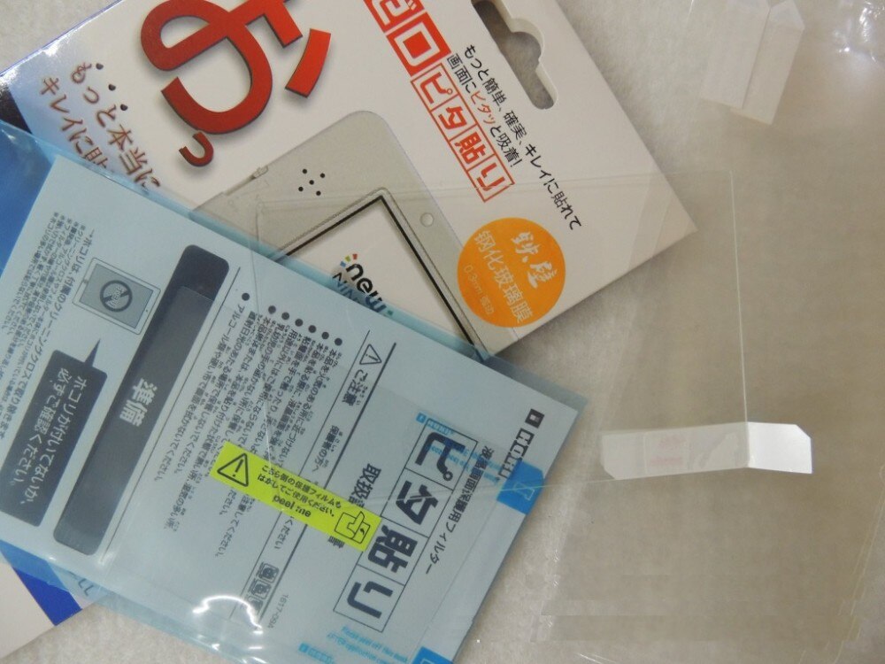 Protecteurs d'écran 0.3mm autocollant d'écran pour nintention bord incurvé enduit verre trempé 3DS Ultra-transparent Film couverture