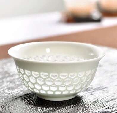 Chinese Jing de zhen Teas Ceramic Hollow Honeycomb Product Tea Box Pu'er Small Tea Cup Kung Fu Tea Set: a