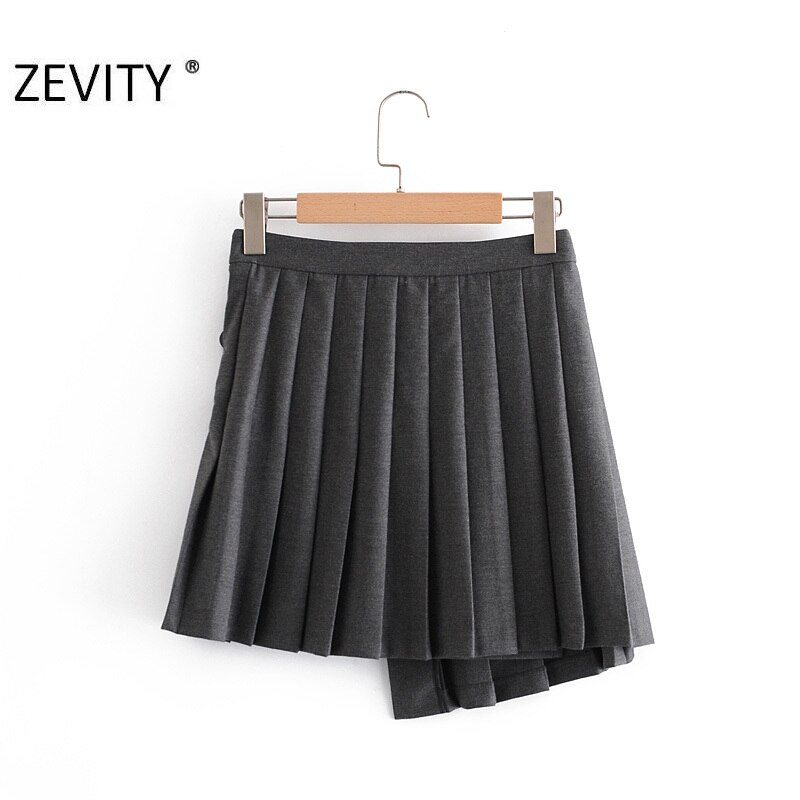 Zevity-Mini jupe plissée pour femme, décoration boucle douce, couleur unie, Style anglais, vêtement Slim et Chic, QUN703, décontracté