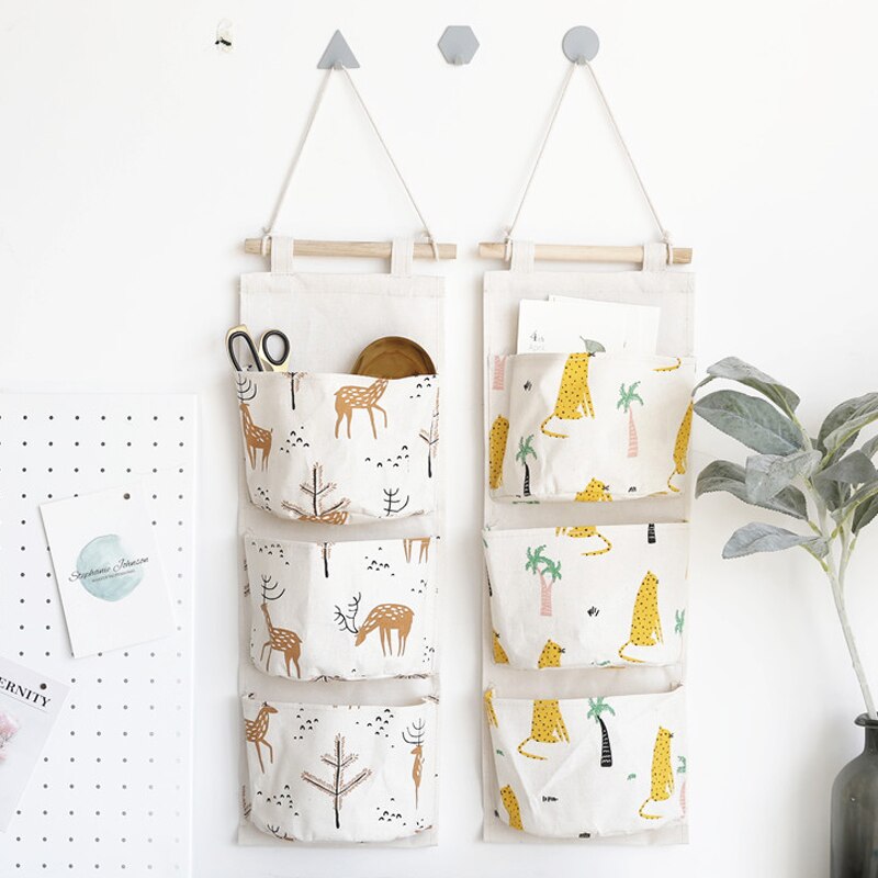 Huishoudelijke benodigdheden hangtas drie zakken ondergoedtas deur achter speelgoed boeken opbergtas