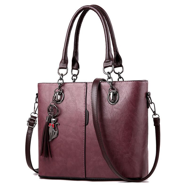 Yogodlns mujer de invierno bolsos de mano de cuero de color con borla y borla colgante de gato: Dark purple