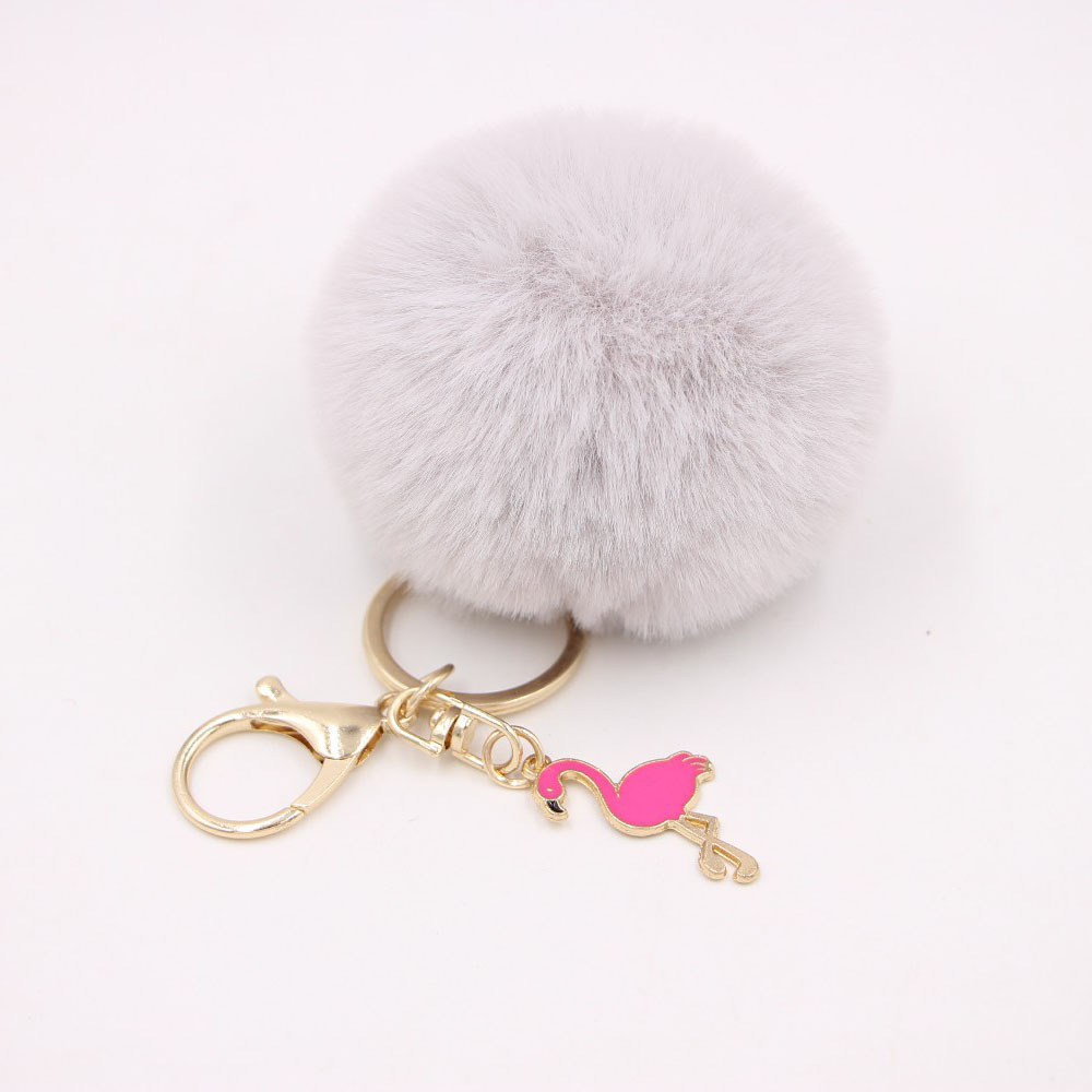 Porte-clés pompon moelleux, porte-clés flamant rose, couronne en peluche, joli porte-clés beurre en peluche, ornement pendentif pour sac à main, rose: Violet / Black