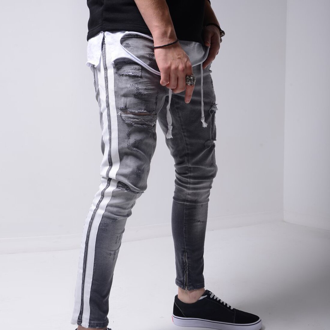 Pantalones pitillo rasgados para Hombre, pantalones vaqueros ajustados con rayas laterales para motociclista, pantalones vaqueros rasgados con agujeros estilo Hip Hop para Hombre