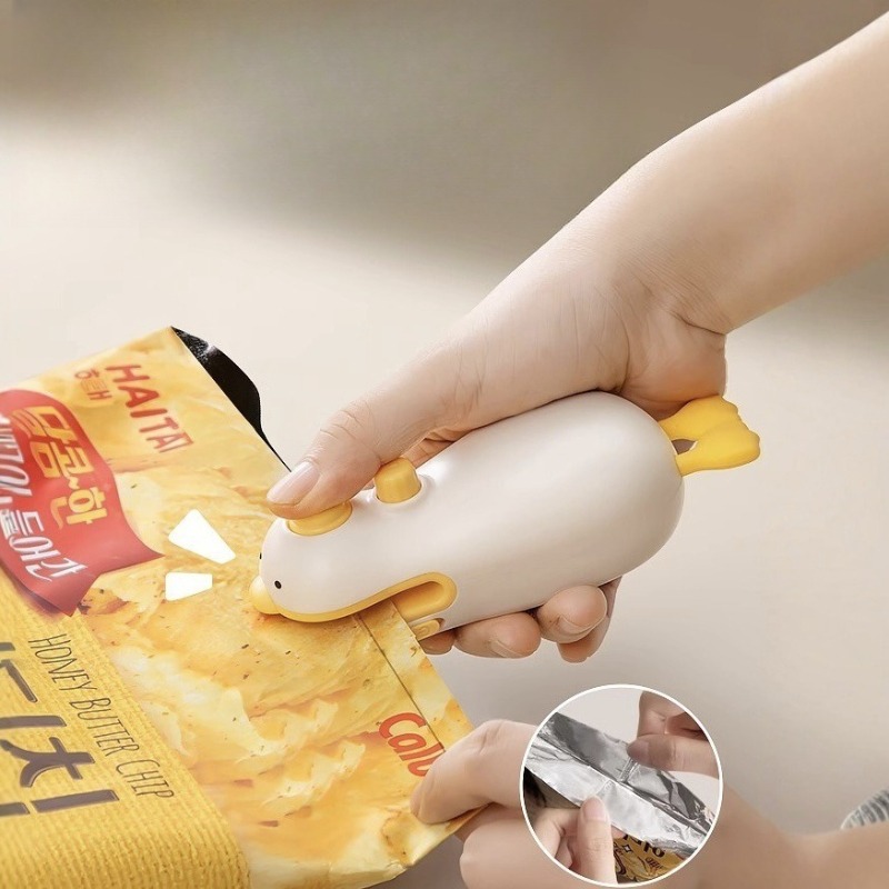 Eenvoudig te gebruiken vacuümverpakkingsmachine, kleine draagbare mini vacuümverpakkingsmachine voor voedsel om te voorkomen dat voedsel vochtig wordt.